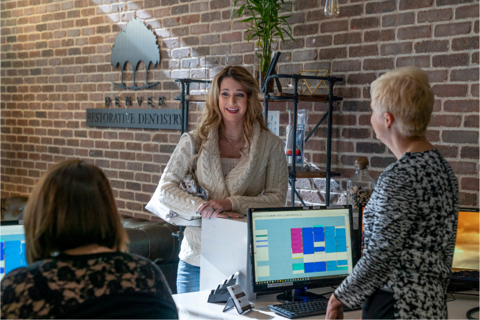 patient checking in at front desk