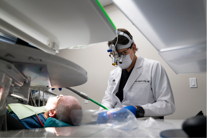 doctor sitting next to patient