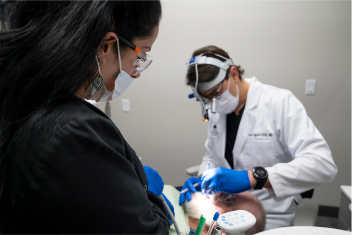 Doctor Working on patient's teeth