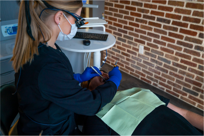 Picture of doctor working on patient